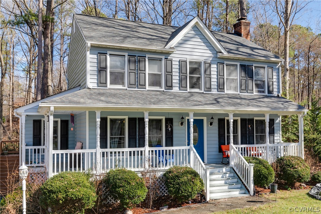 7425 Secretariat Drive Midlothian, VA 23112 - Photo 1 of 37 a view of brick house with large windows