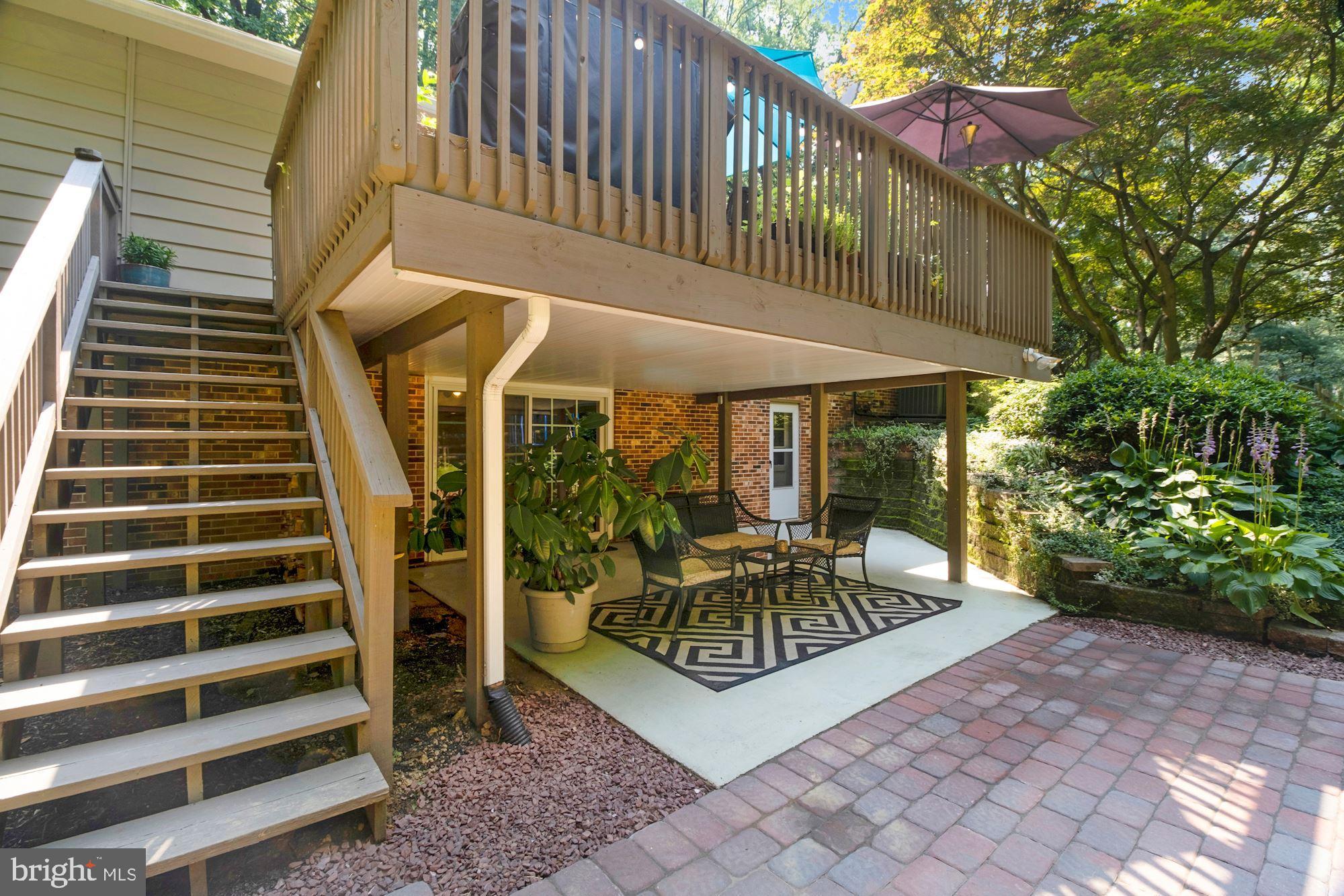 966 Lee Road Kennett Square, PA 19348 - Photo 7 of 51 Back patio and deck w/ stairs