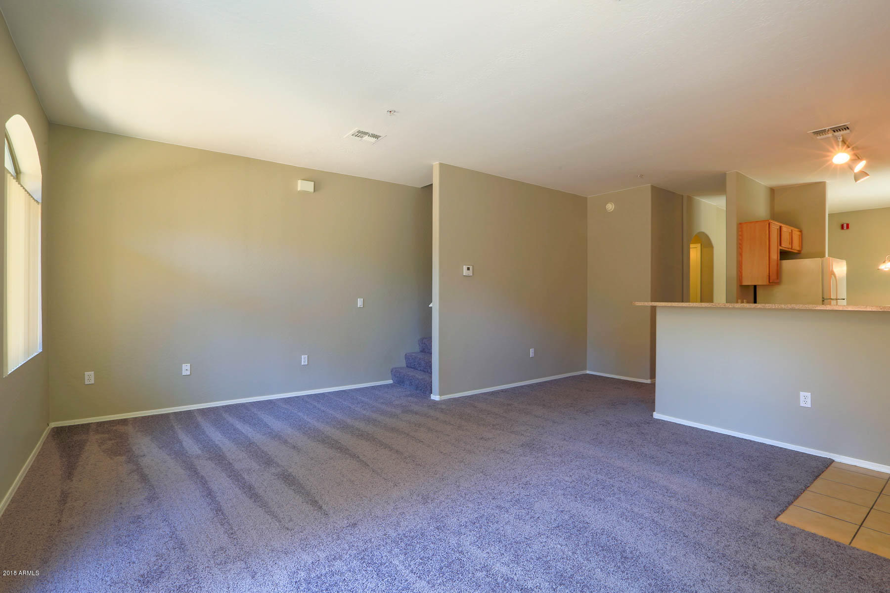 2150 East Bell Road, Unit 1042 Phoenix, AZ 85022 - Photo 3 of 26 2150EBellRdUNIT1042-3