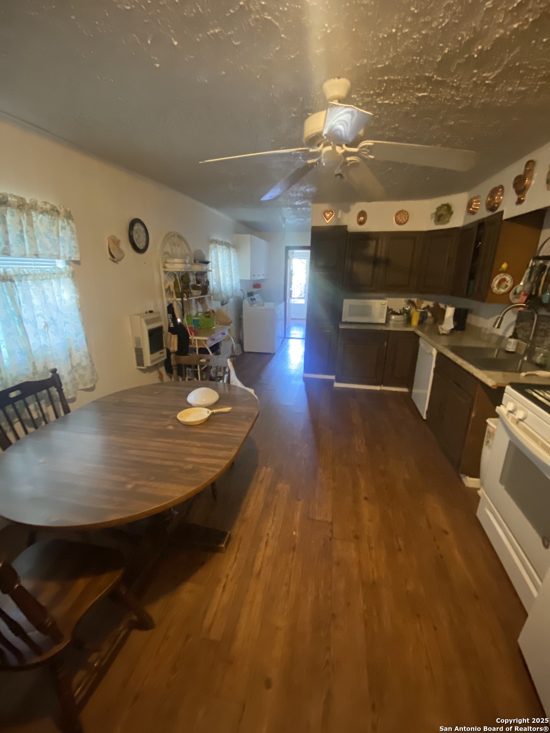 516 West Dunlap Avenue Sabinal, TX 78881 - Photo 13 of 23 a dining room with a table and chairs