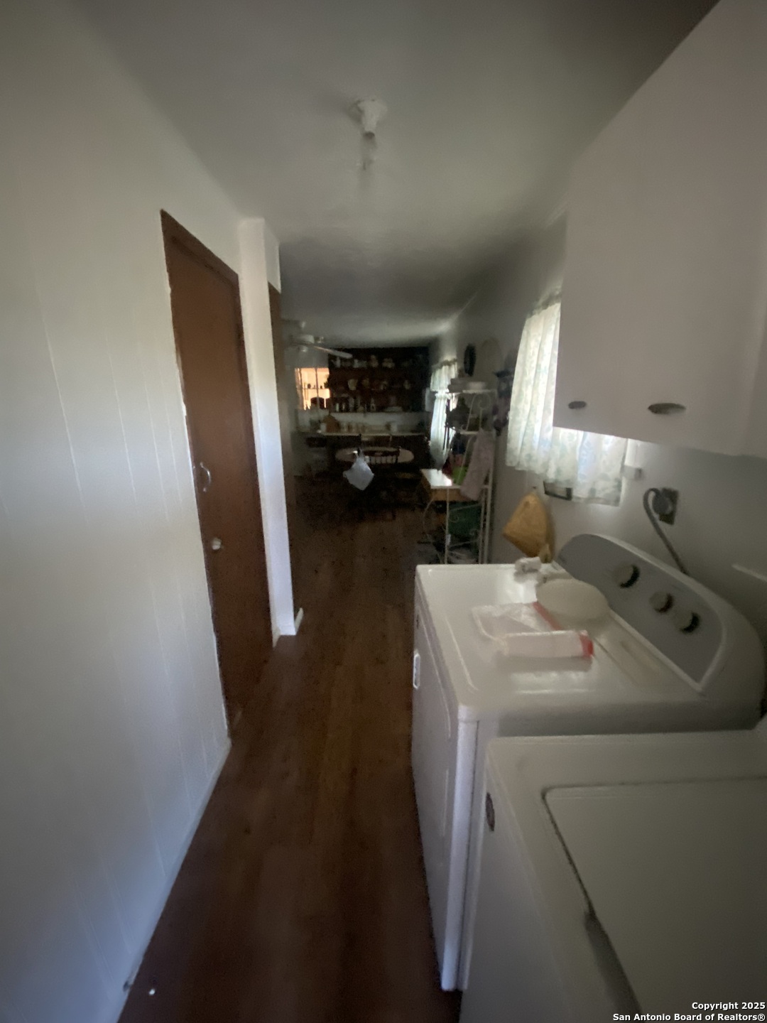 516 West Dunlap Avenue Sabinal, TX 78881 - Photo 14 of 23 a utility room with dryer and washer