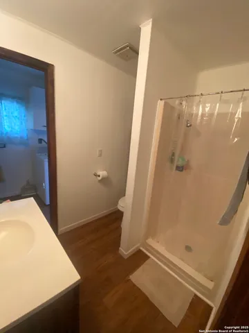 a bathroom with a sink and a toilet
