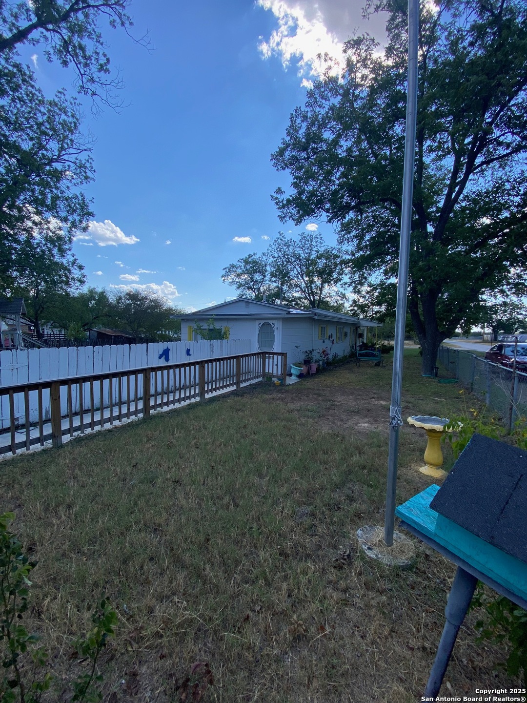 516 West Dunlap Avenue Sabinal, TX 78881 - Photo 5 of 23 a view of a park with iron fence