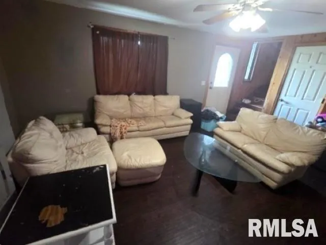 a kitchen with refrigerator and window