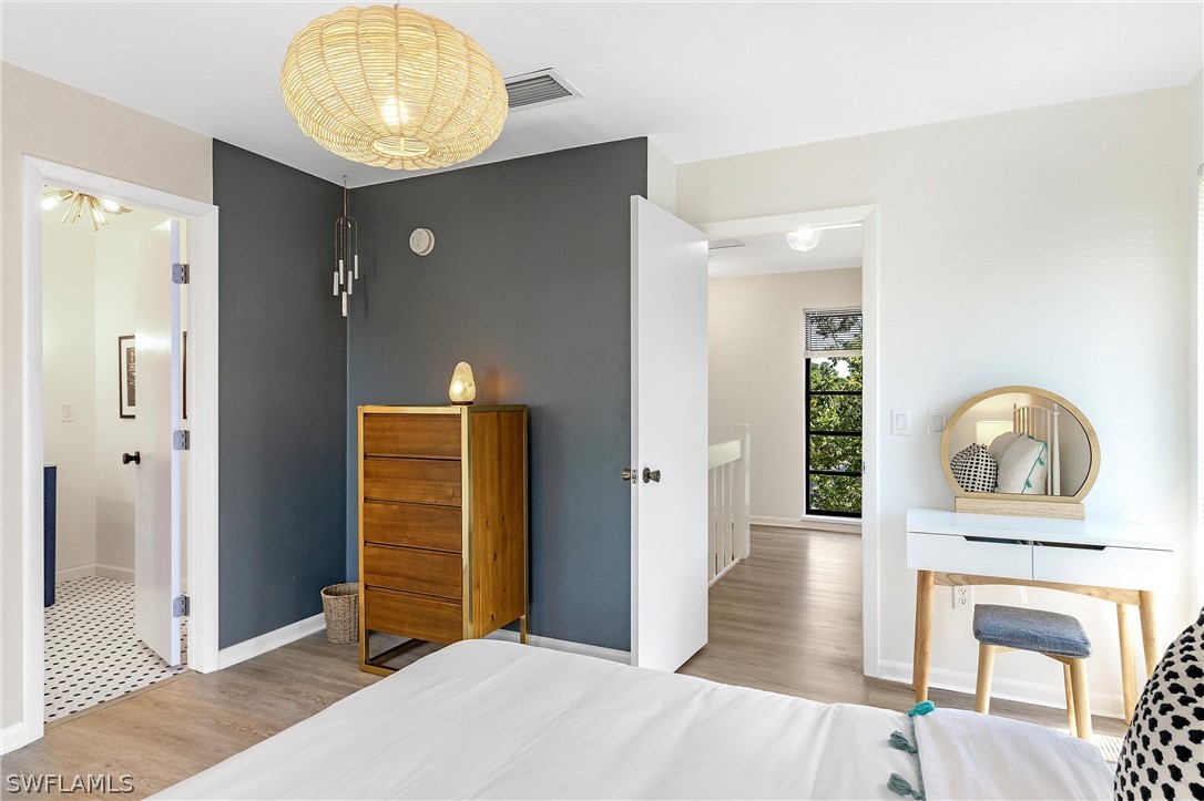 10 Sunset Captiva Lane Captiva, FL 33924 - Photo 23 of 33 a view of a livingroom with wooden floor