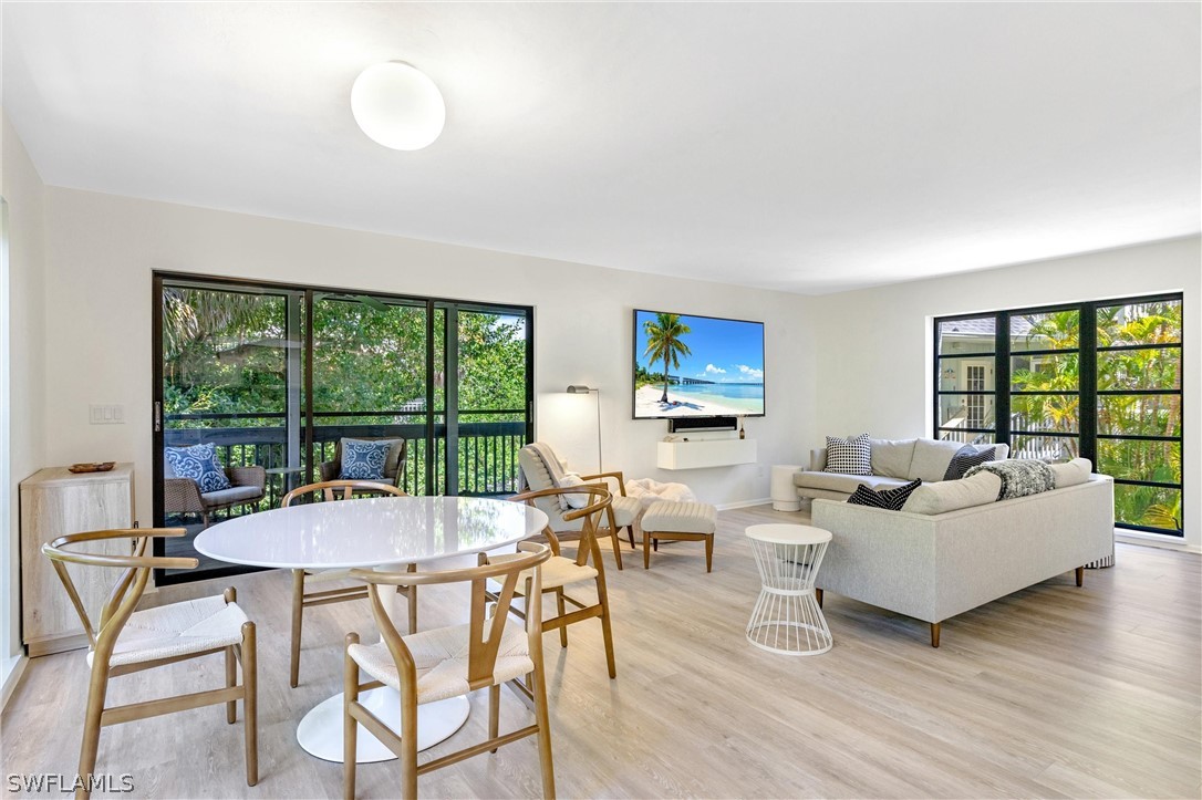 10 Sunset Captiva Lane Captiva, FL 33924 - Photo 8 of 33 a living room with furniture and a large window