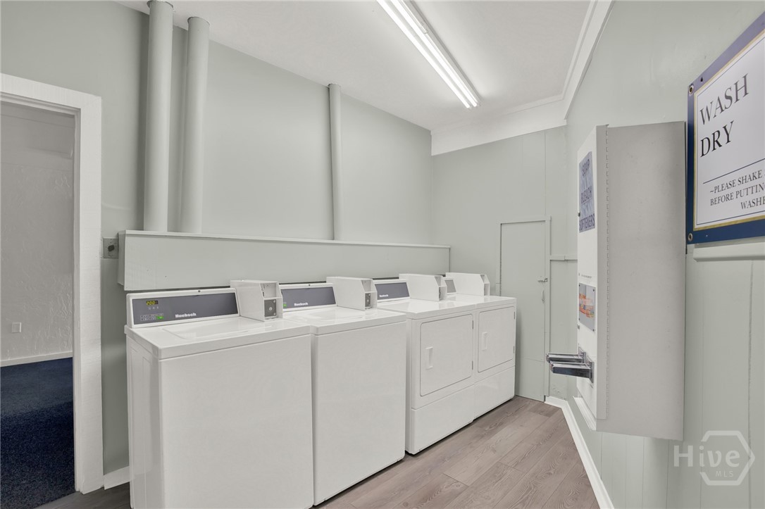 1217 Bay Street, Unit 105B Tybee Island, GA 31328 - Photo 36 of 46 Savannah Beach & Racquet Club Laundry Room