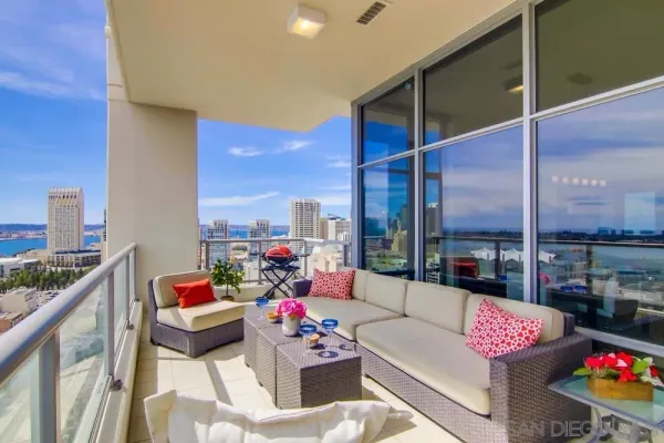 a view of a balcony with city view