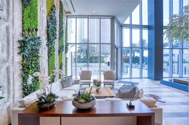 a view of swimming pool with outdoor seating