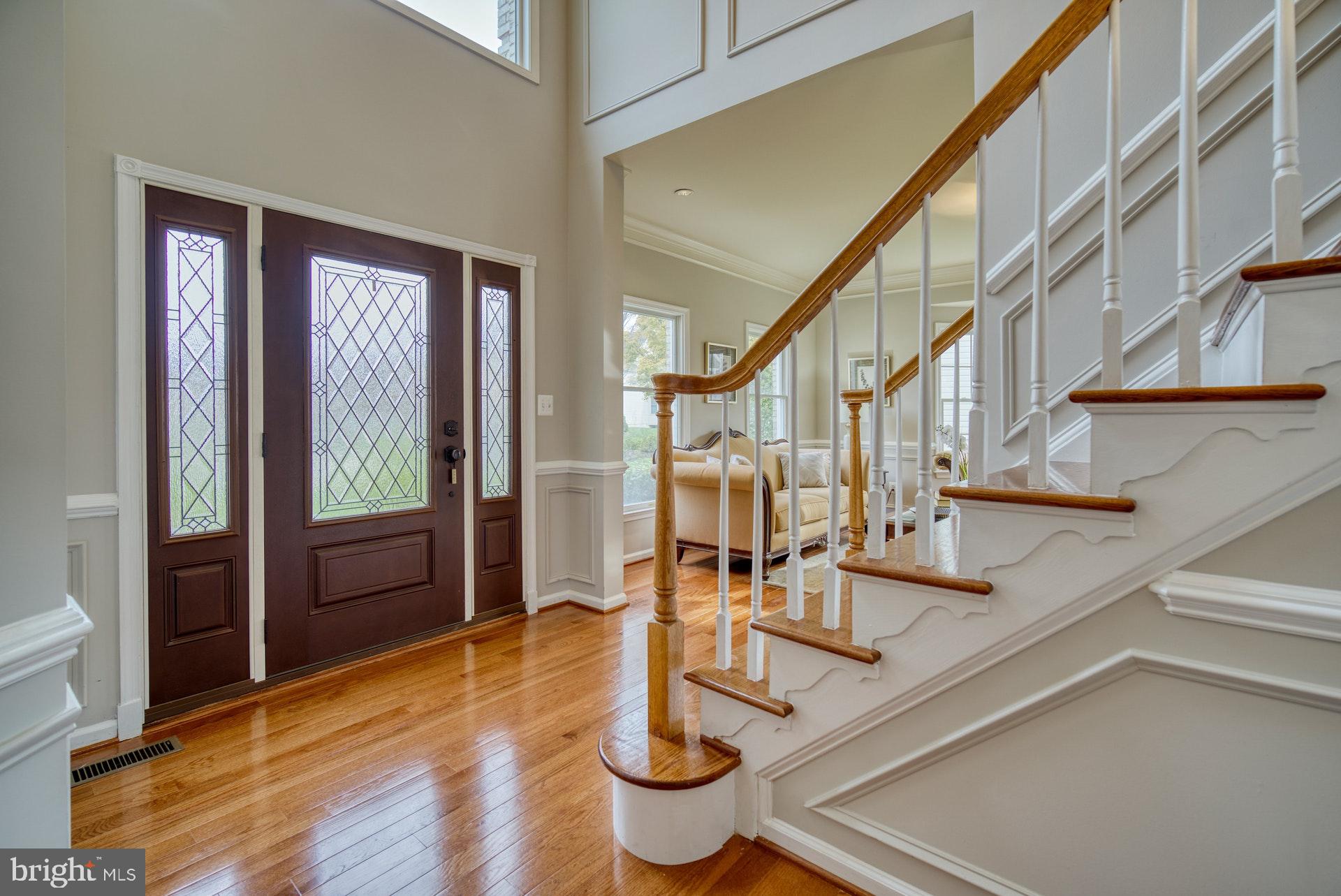 10868 Grovehampton Court Reston, VA 20194 - Photo 19 of 48 Foyer with Custom Door