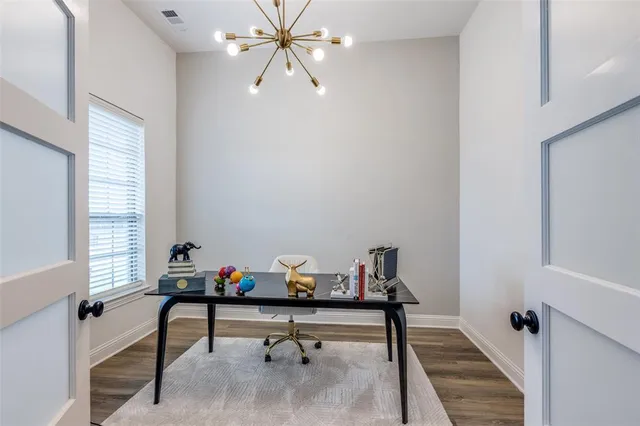 a reading room with furniture and window