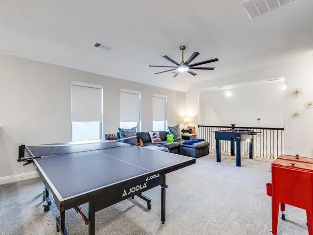 a view of a livingroom with furniture