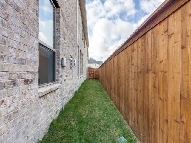a view of a pathway with a building in the background