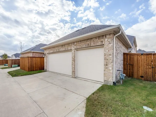 a view of backyard with cabin