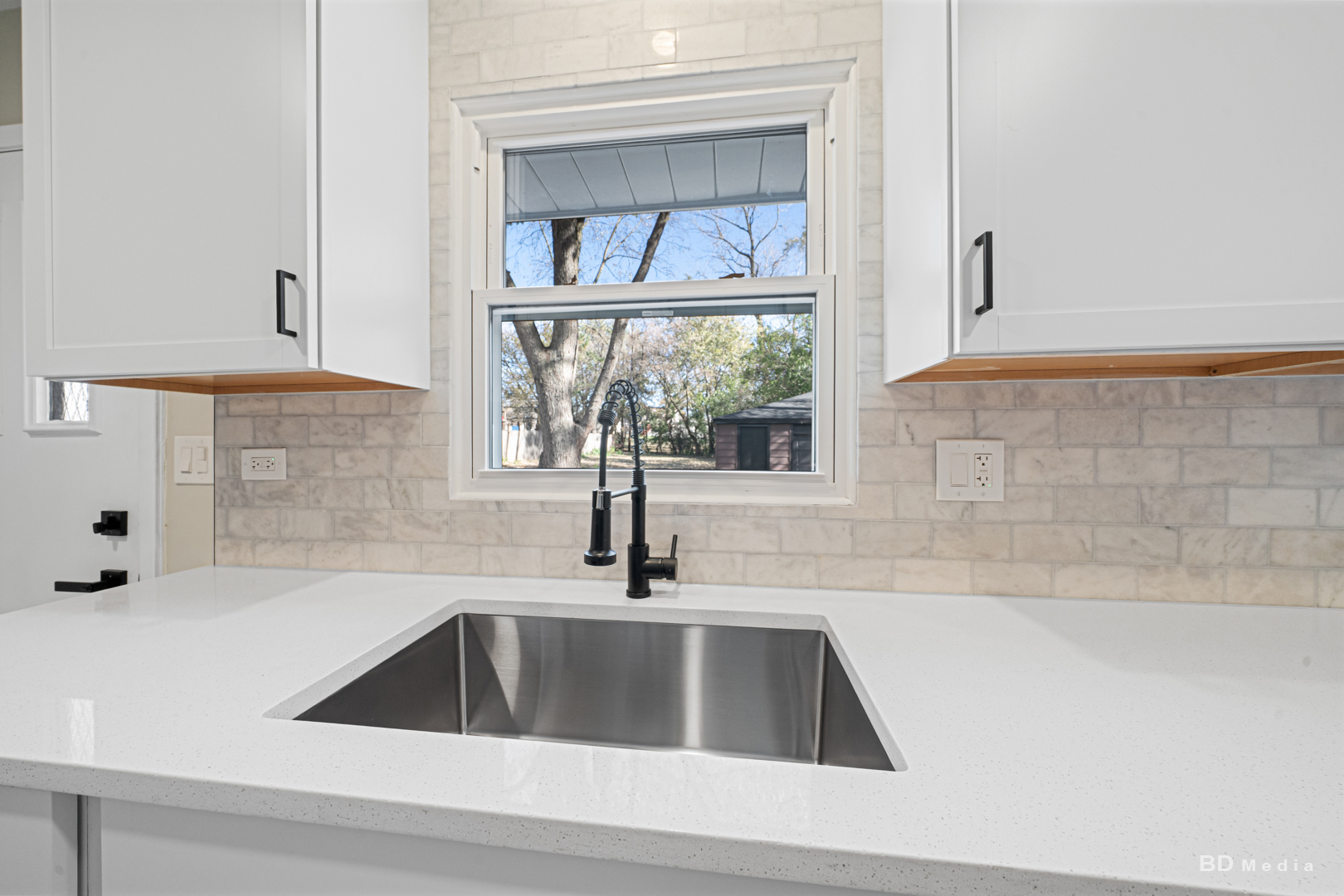 6205 Belmont Road Downers Grove, IL 60516 - Photo 13 of 30 a kitchen with a sink and a window