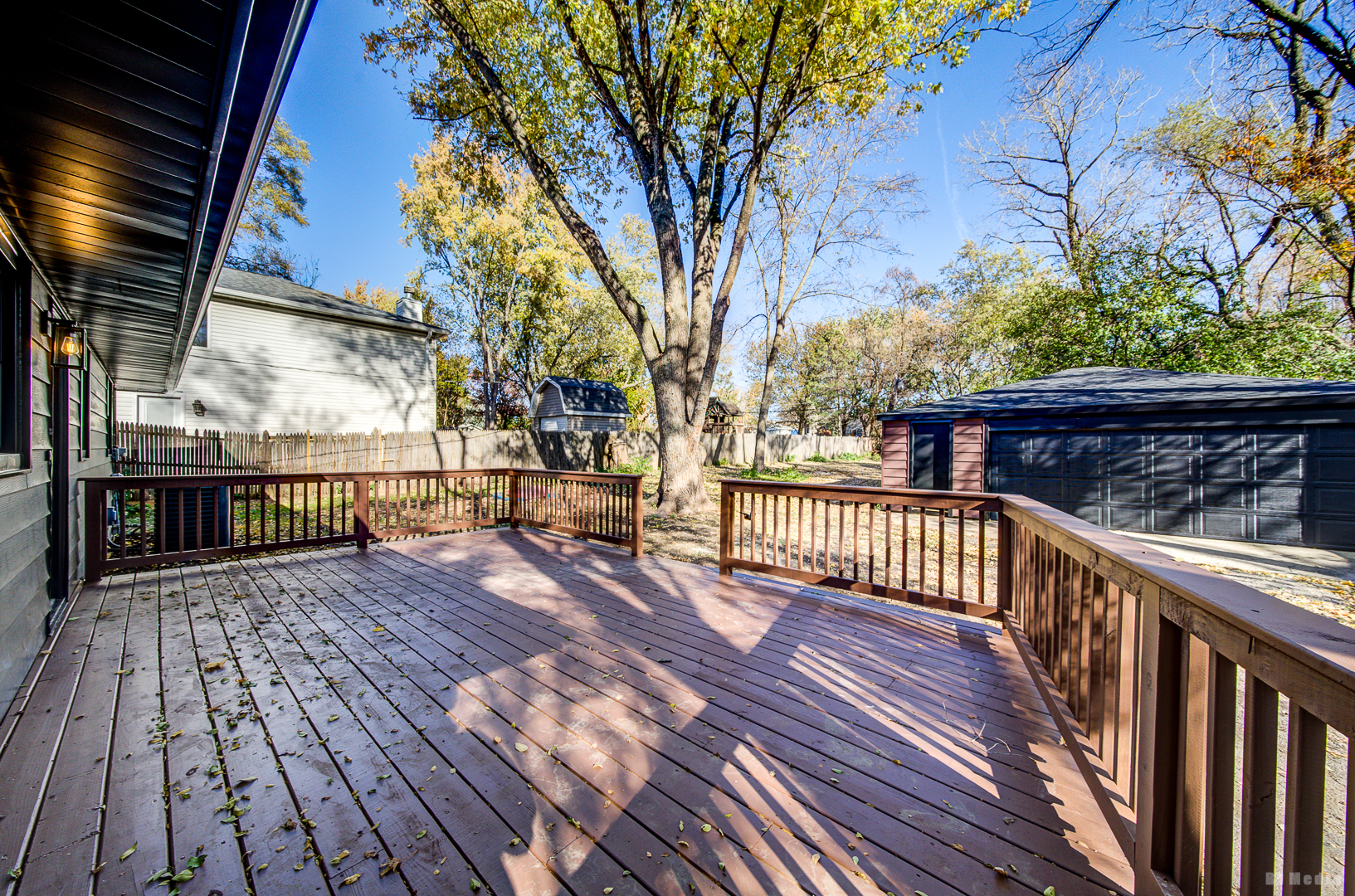 6205 Belmont Road Downers Grove, IL 60516 - Photo 26 of 30 a view of deck with wooden floor and outdoor seating