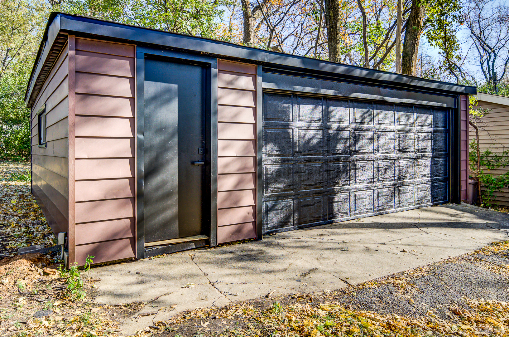 6205 Belmont Road Downers Grove, IL 60516 - Photo 27 of 30 a view of a house with a door and wooden fence