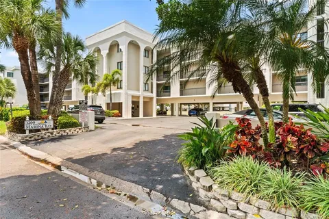 a view of multiple houses with a street