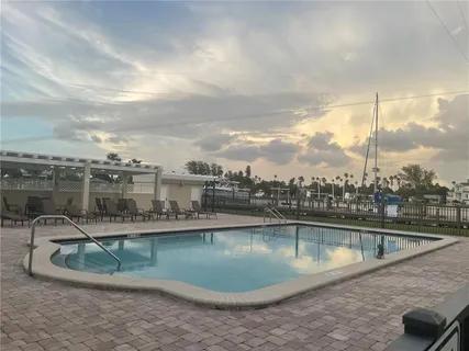 a view of a swimming pool with a lake view