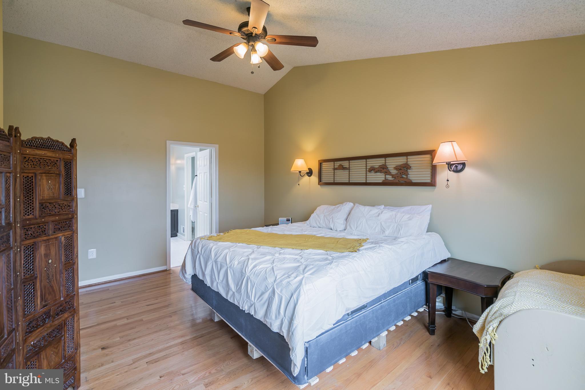 8593 Signal Hill Road Manassas, VA 20110 - Photo 15 of 30 Vaulted ceiling, ceiling fan, hardwoods