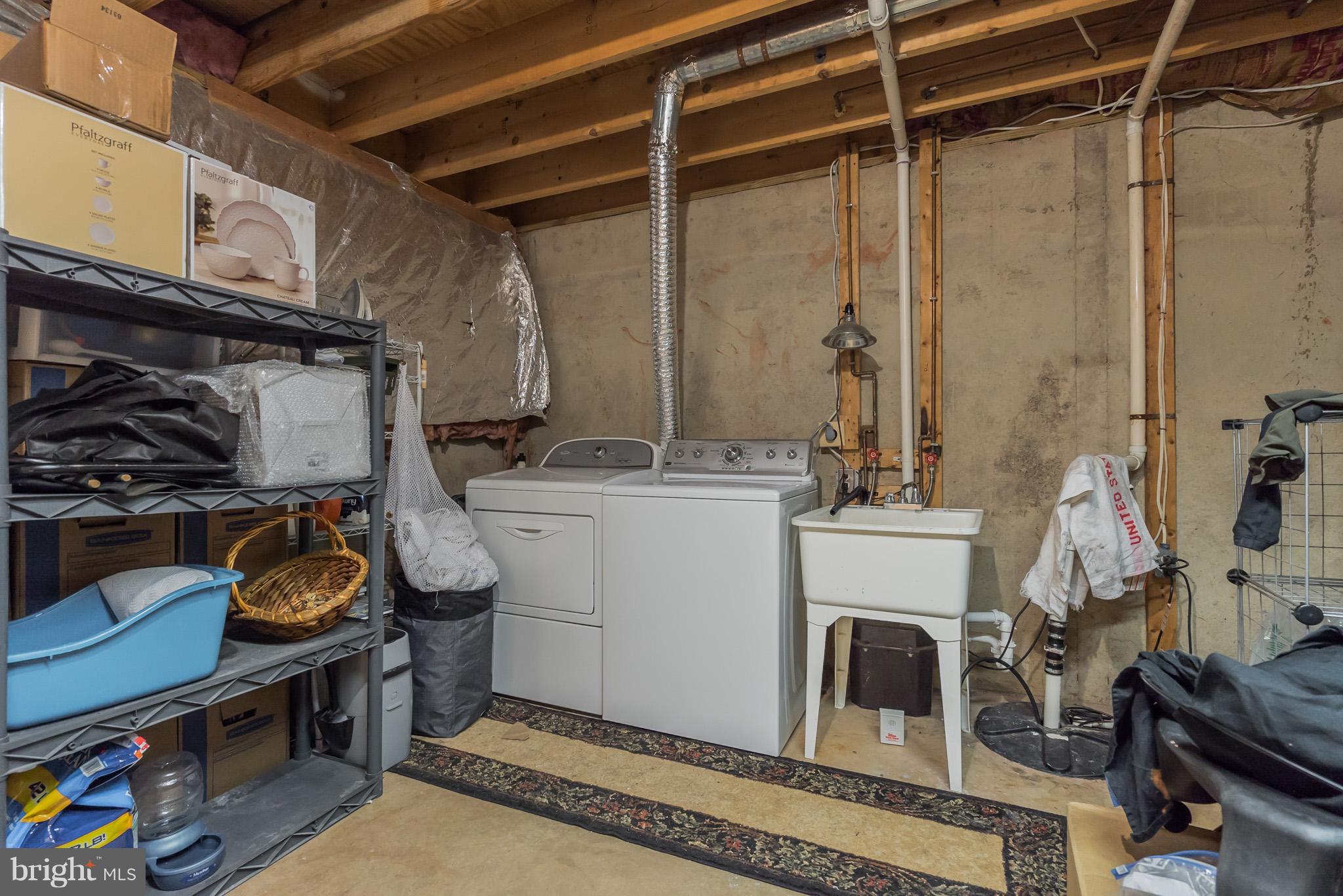 8593 Signal Hill Road Manassas, VA 20110 - Photo 28 of 30 Laundry conveys. Large storage room.
