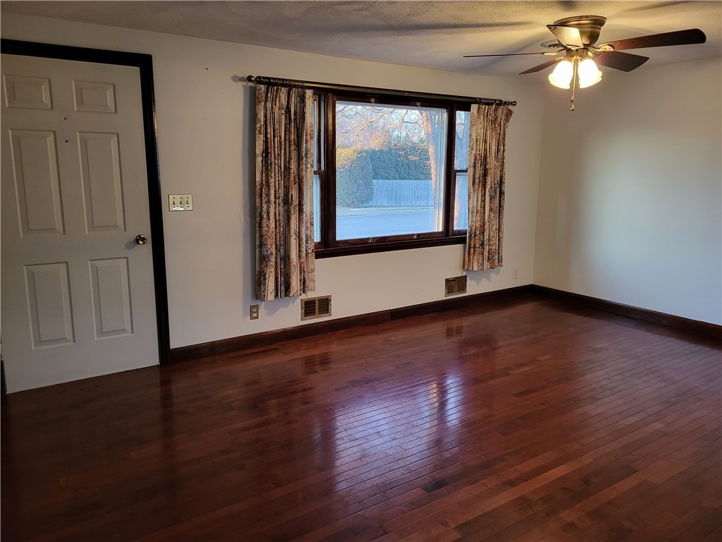 160 Amherst Road Warwick, RI 02889 - Photo 7 of 30 Living room has hardwood floors