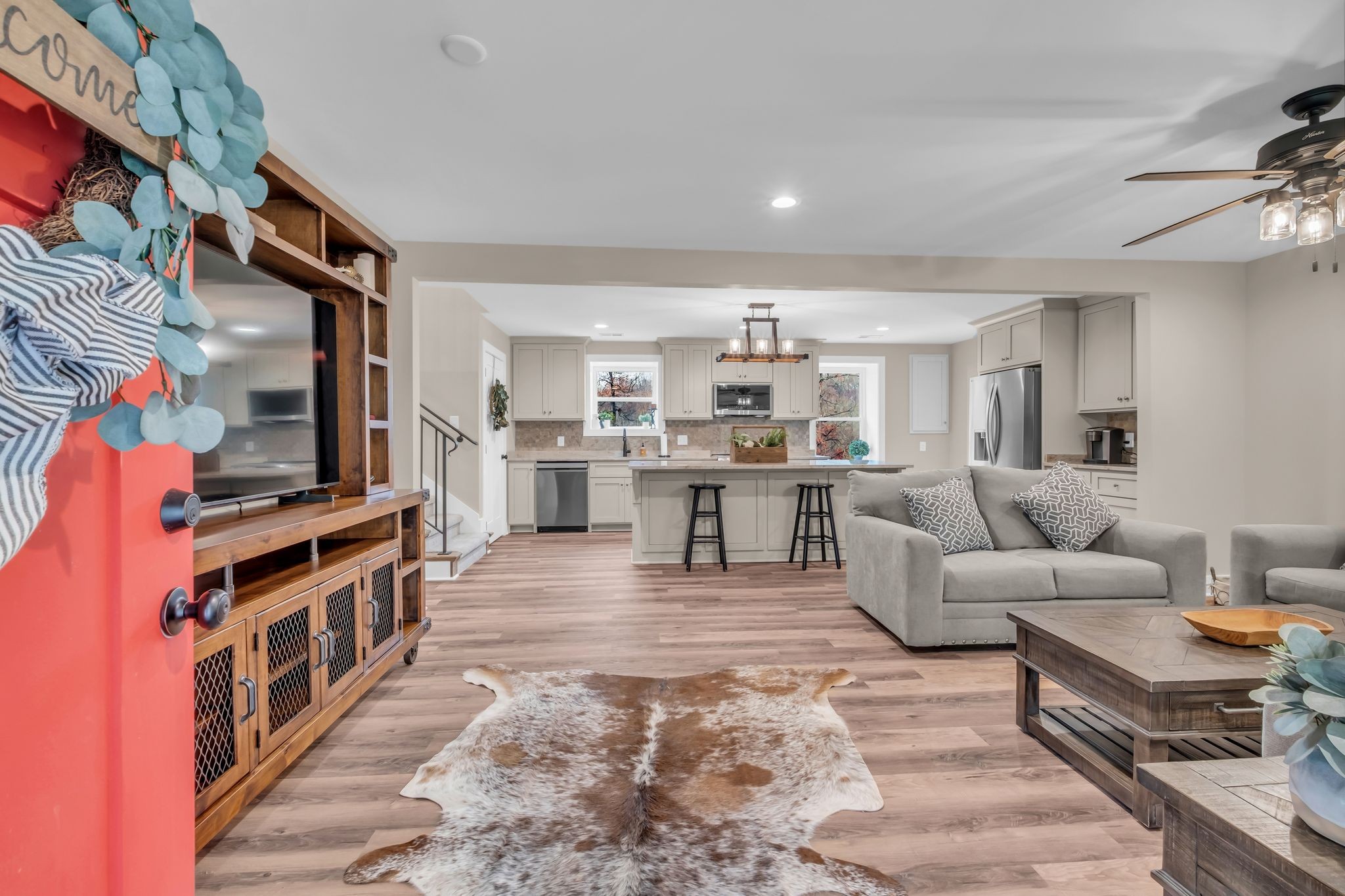 372 Lee Road Cottontown, TN 37048 - Photo 12 of 52 a living room with furniture and a kitchen