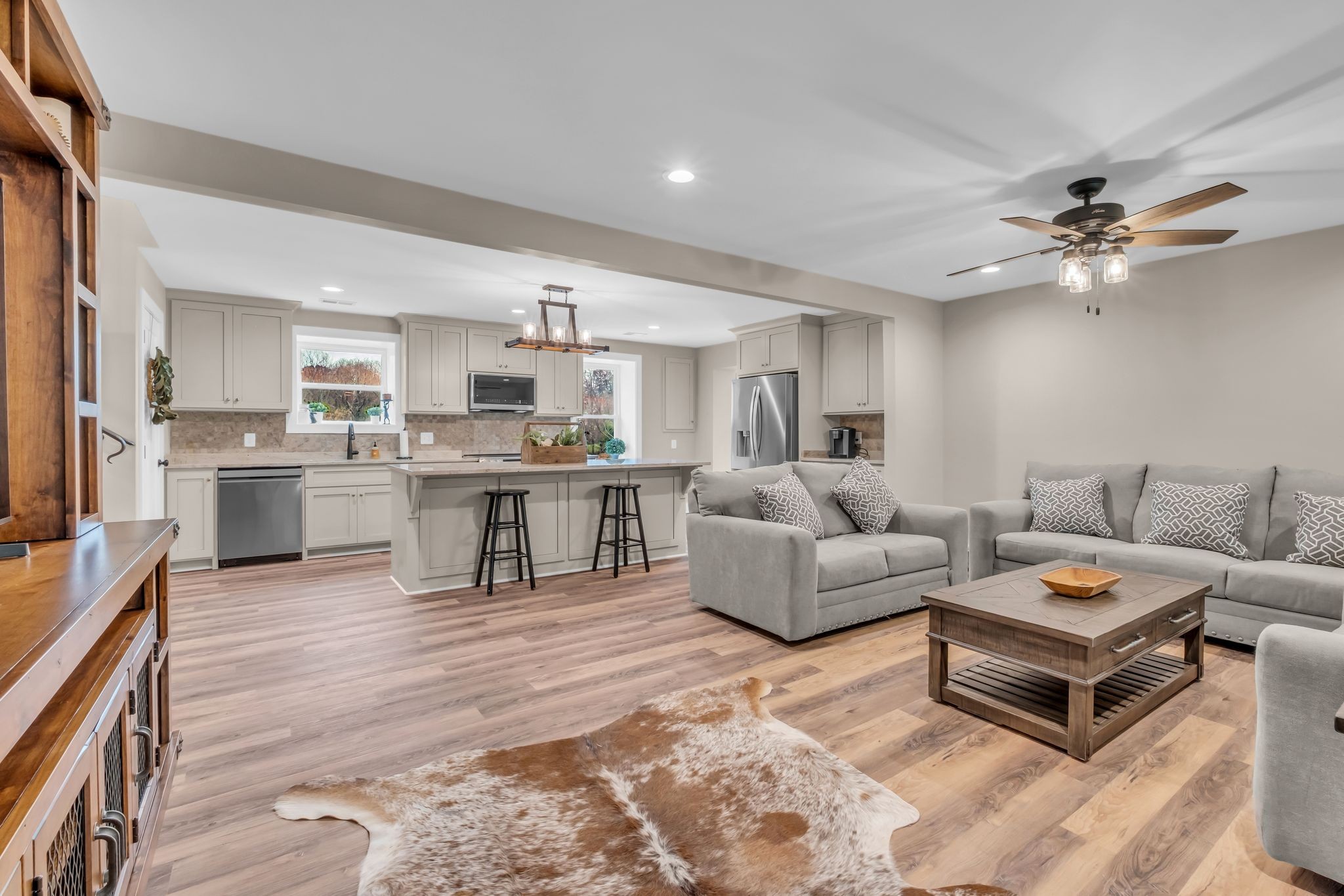 372 Lee Road Cottontown, TN 37048 - Photo 14 of 52 a living room with furniture and kitchen view
