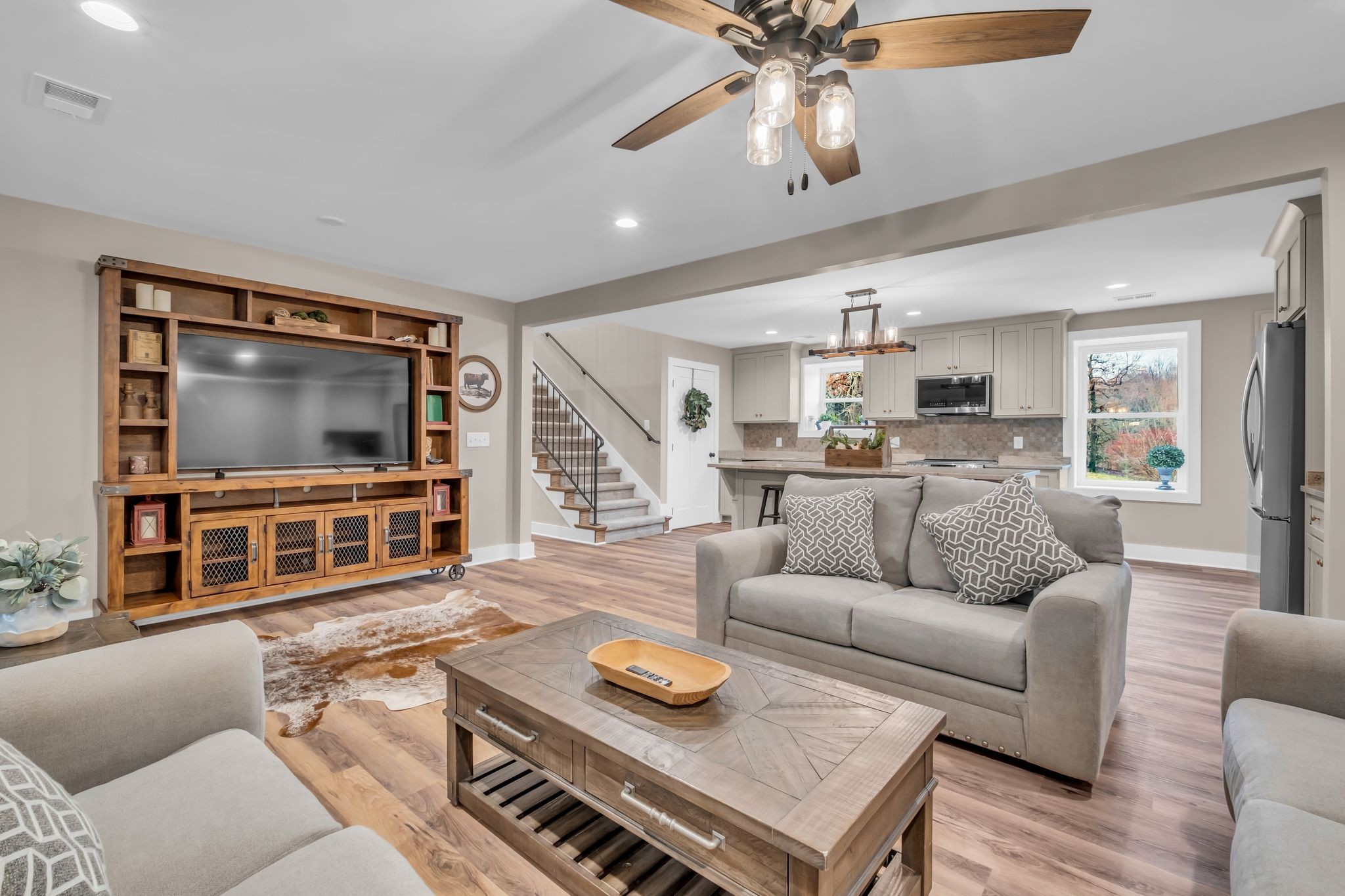 372 Lee Road Cottontown, TN 37048 - Photo 15 of 52 a living room with furniture and a flat screen tv