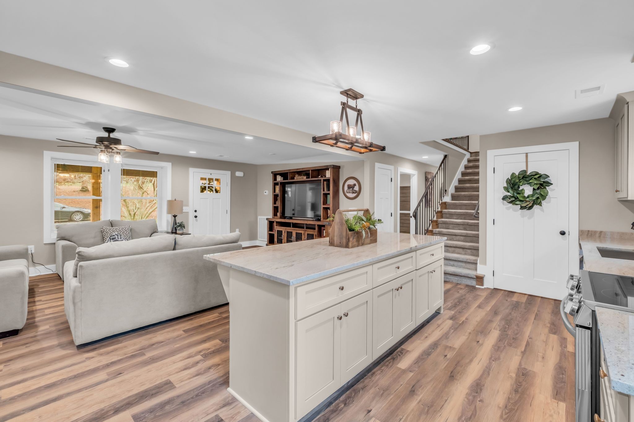 372 Lee Road Cottontown, TN 37048 - Photo 18 of 52 a large white kitchen with cabinets a sink and appliances