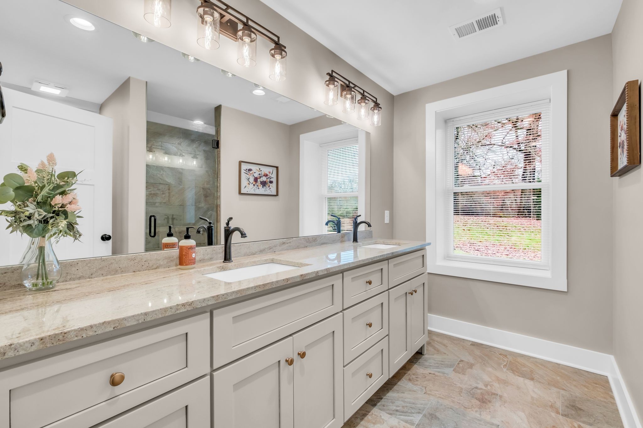 372 Lee Road Cottontown, TN 37048 - Photo 26 of 52 a bathroom with a granite countertop sink mirror and window