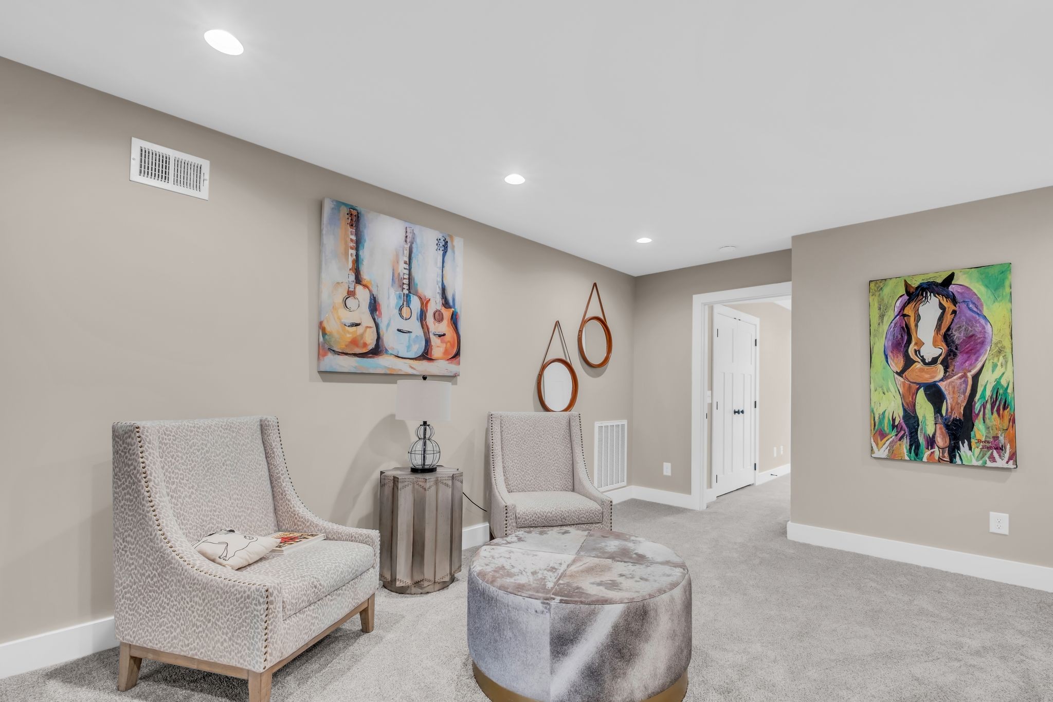 372 Lee Road Cottontown, TN 37048 - Photo 33 of 52 a living room with furniture and a wall painting