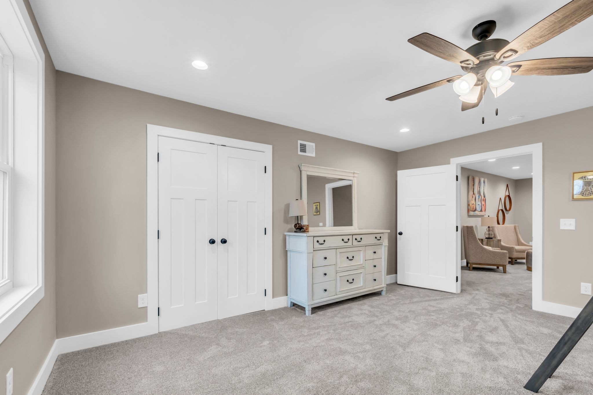 372 Lee Road Cottontown, TN 37048 - Photo 35 of 52 a view of room with chandelier fan and windows