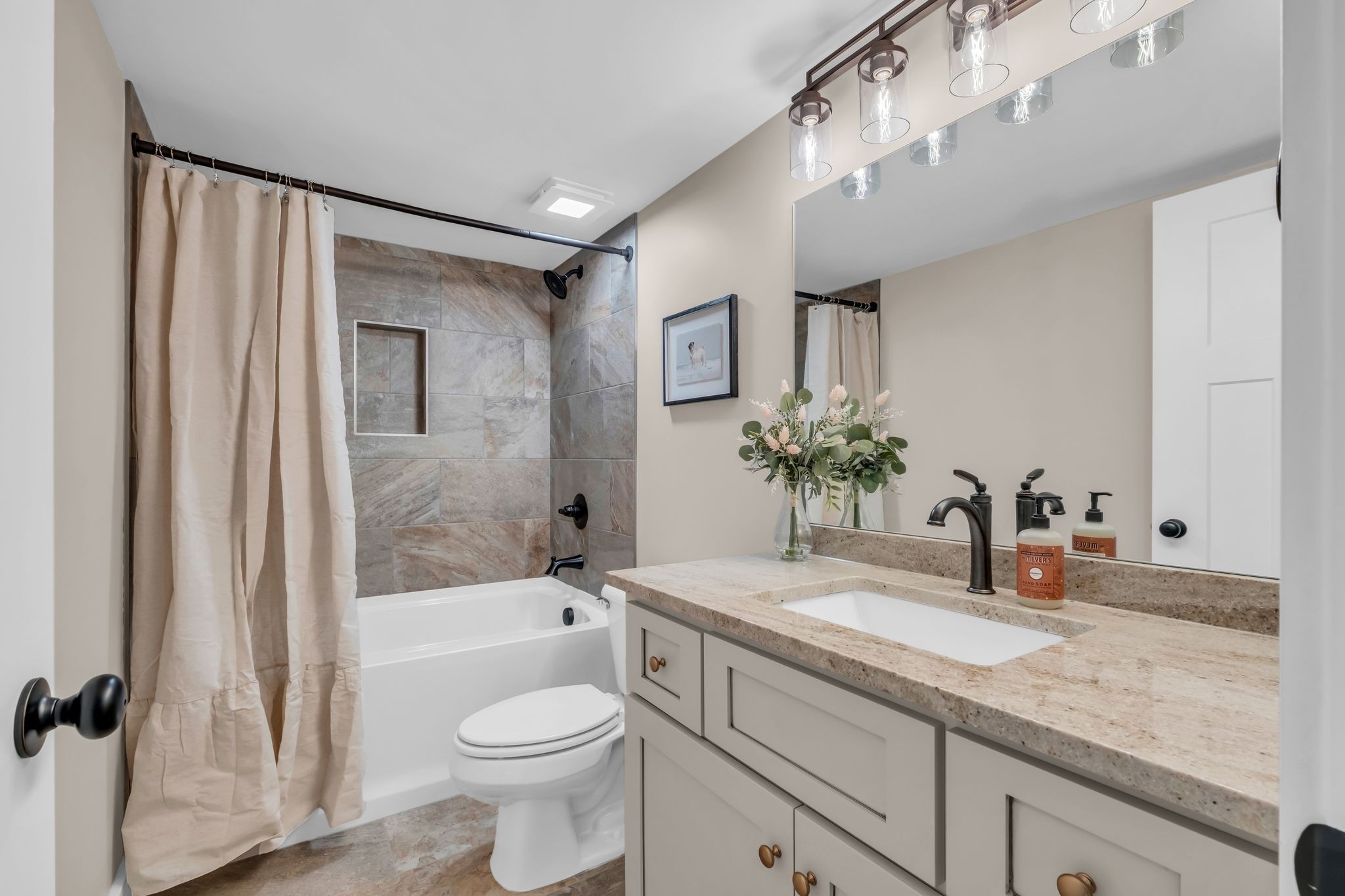372 Lee Road Cottontown, TN 37048 - Photo 38 of 52 a bathroom with a granite countertop sink toilet and shower