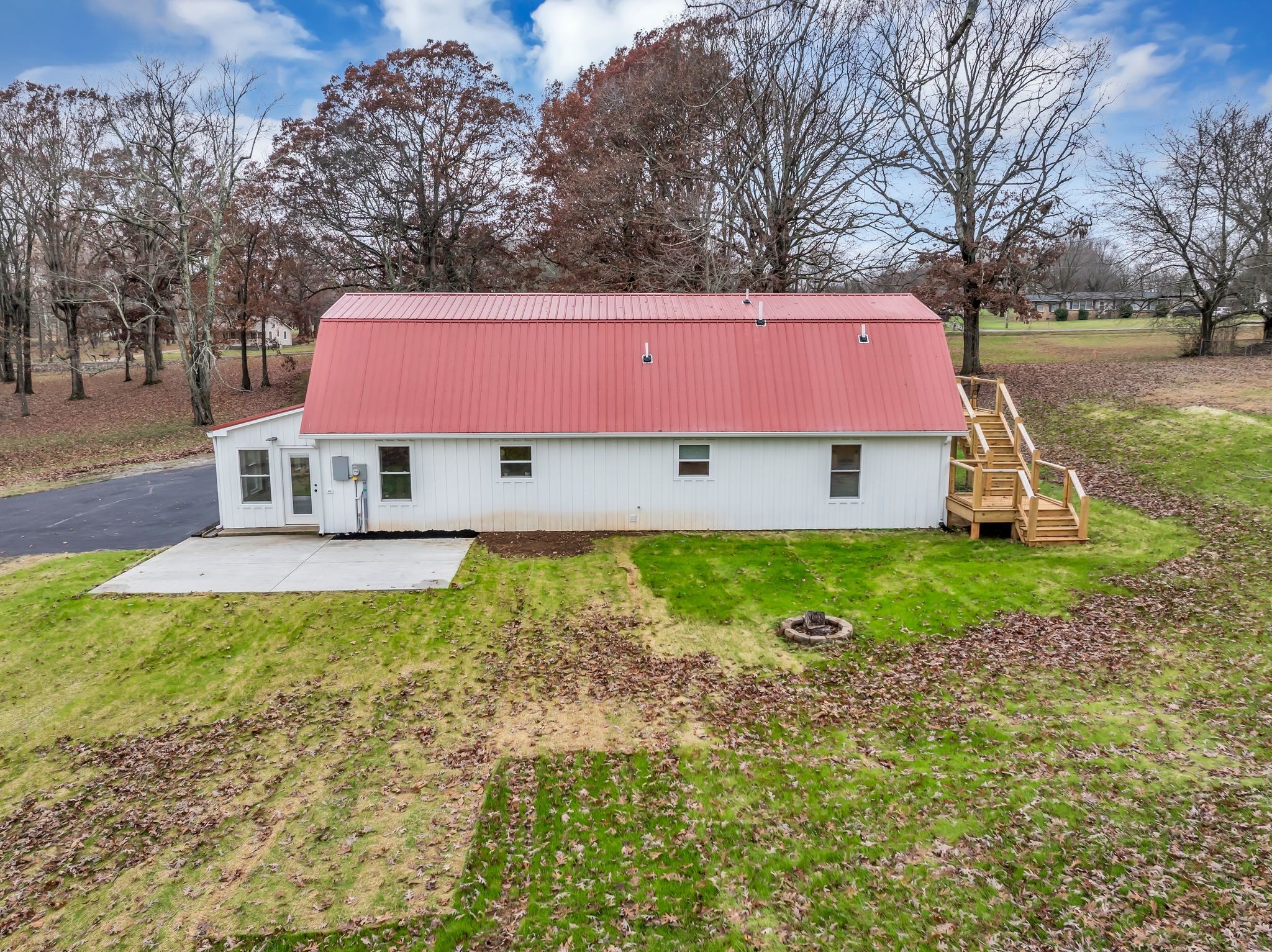 372 Lee Road Cottontown, TN 37048 - Photo 41 of 52 a view of a house with a yard and sitting area