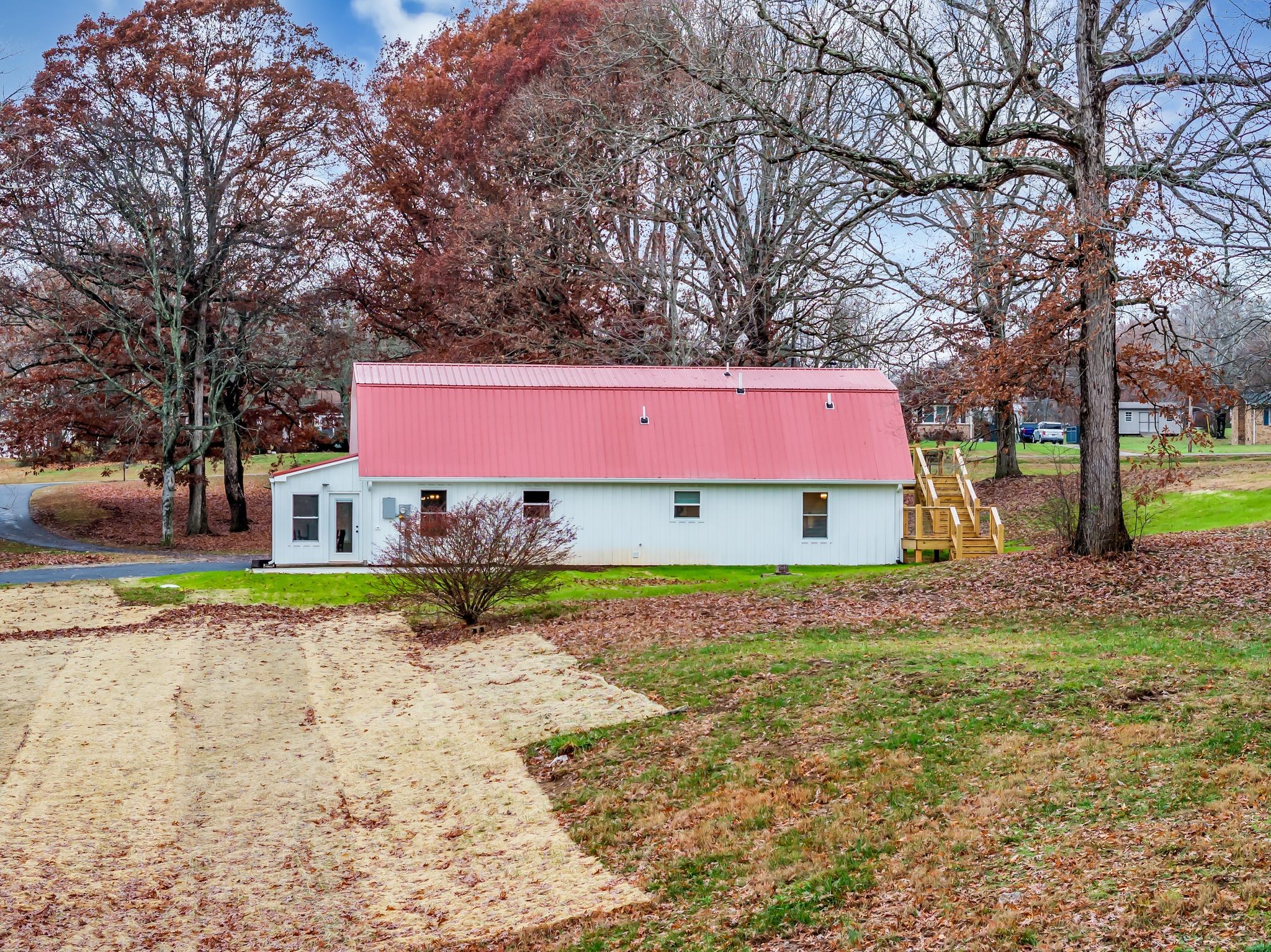 372 Lee Road Cottontown, TN 37048 - Photo 44 of 52 a view of a house with a yard