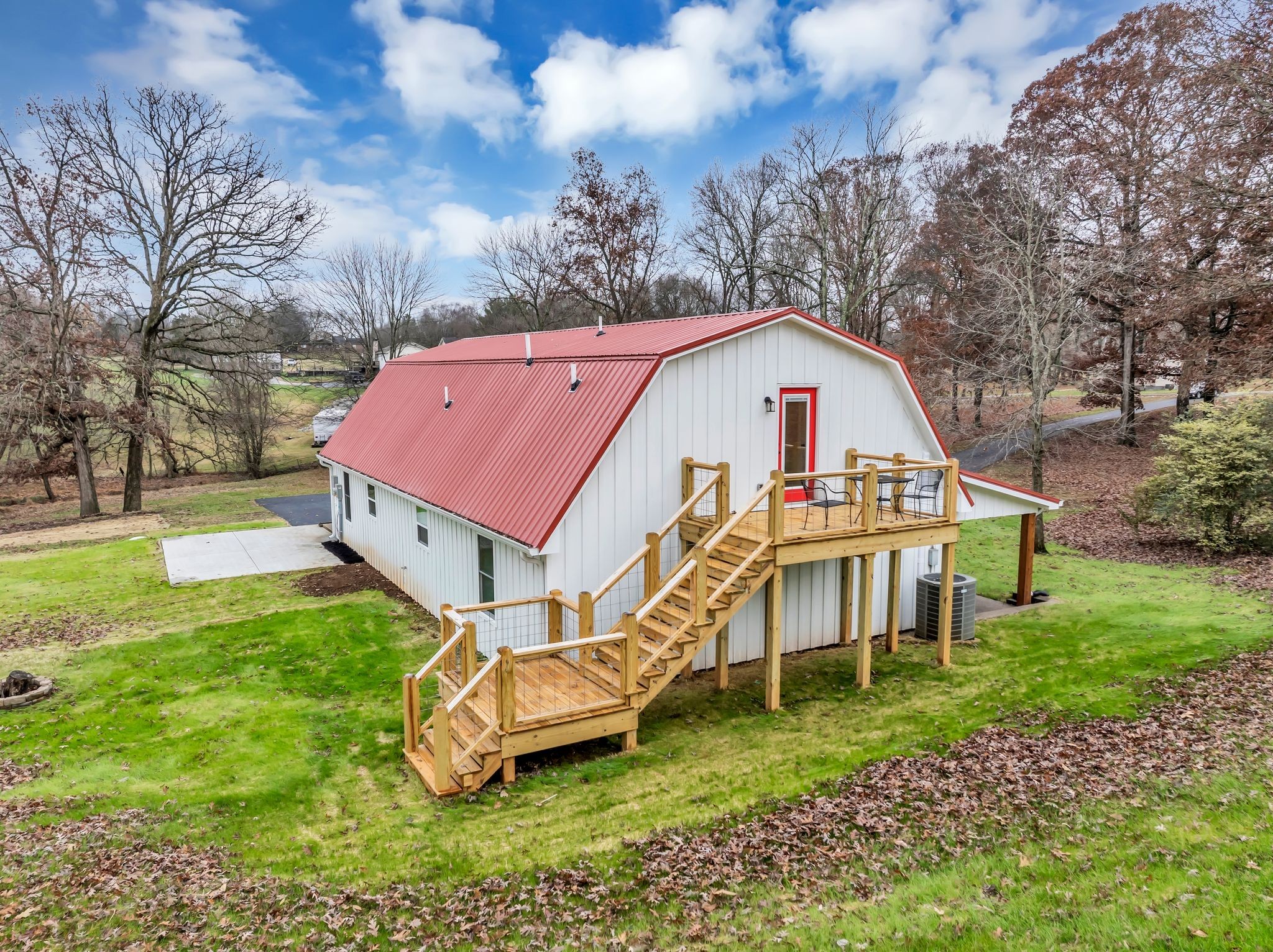 372 Lee Road Cottontown, TN 37048 - Photo 46 of 52 a view of a house with a yard