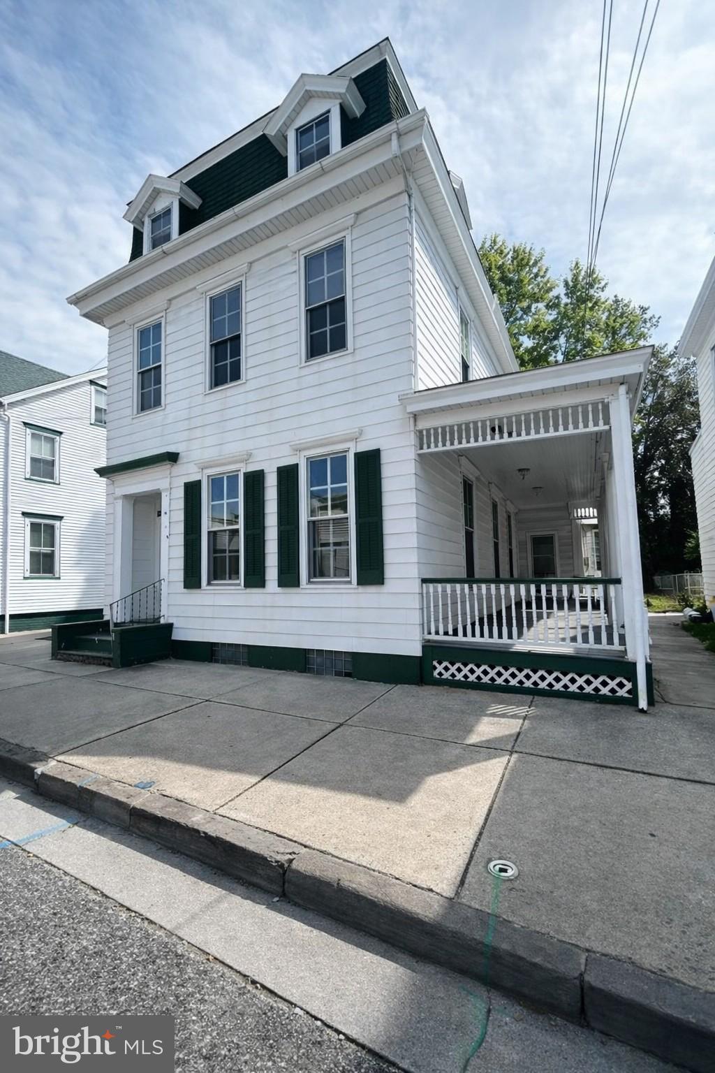 190 7th Street, Unit 1 Salem, NJ 08079 - Photo 1 of 16 a front view of a house with a yard