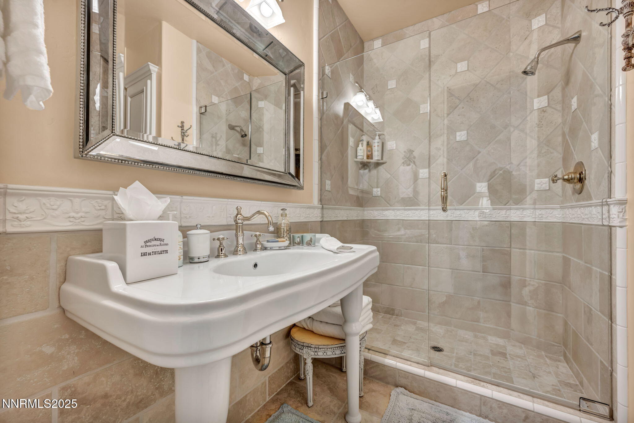 3820 Frost Lane Reno, NV 89511 - Photo 115 of 239 a bathroom with a sink a mirror and a shower