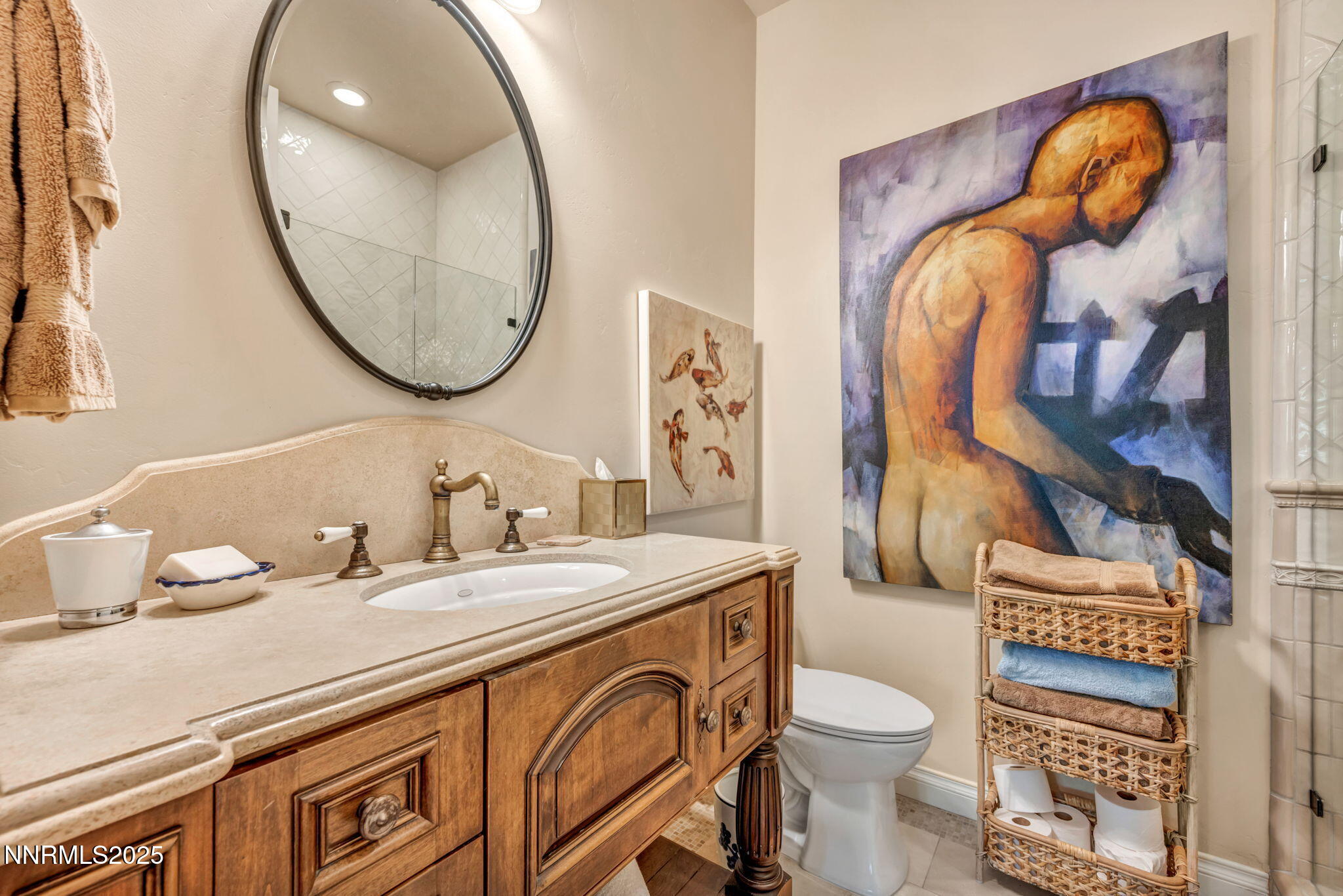 3820 Frost Lane Reno, NV 89511 - Photo 122 of 239 a bathroom with a toilet a sink and a mirror