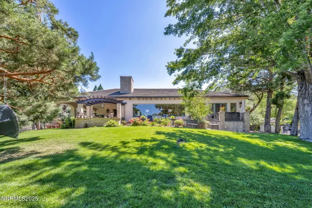 a kitchen with stainless steel appliances granite countertop a stove and a sink