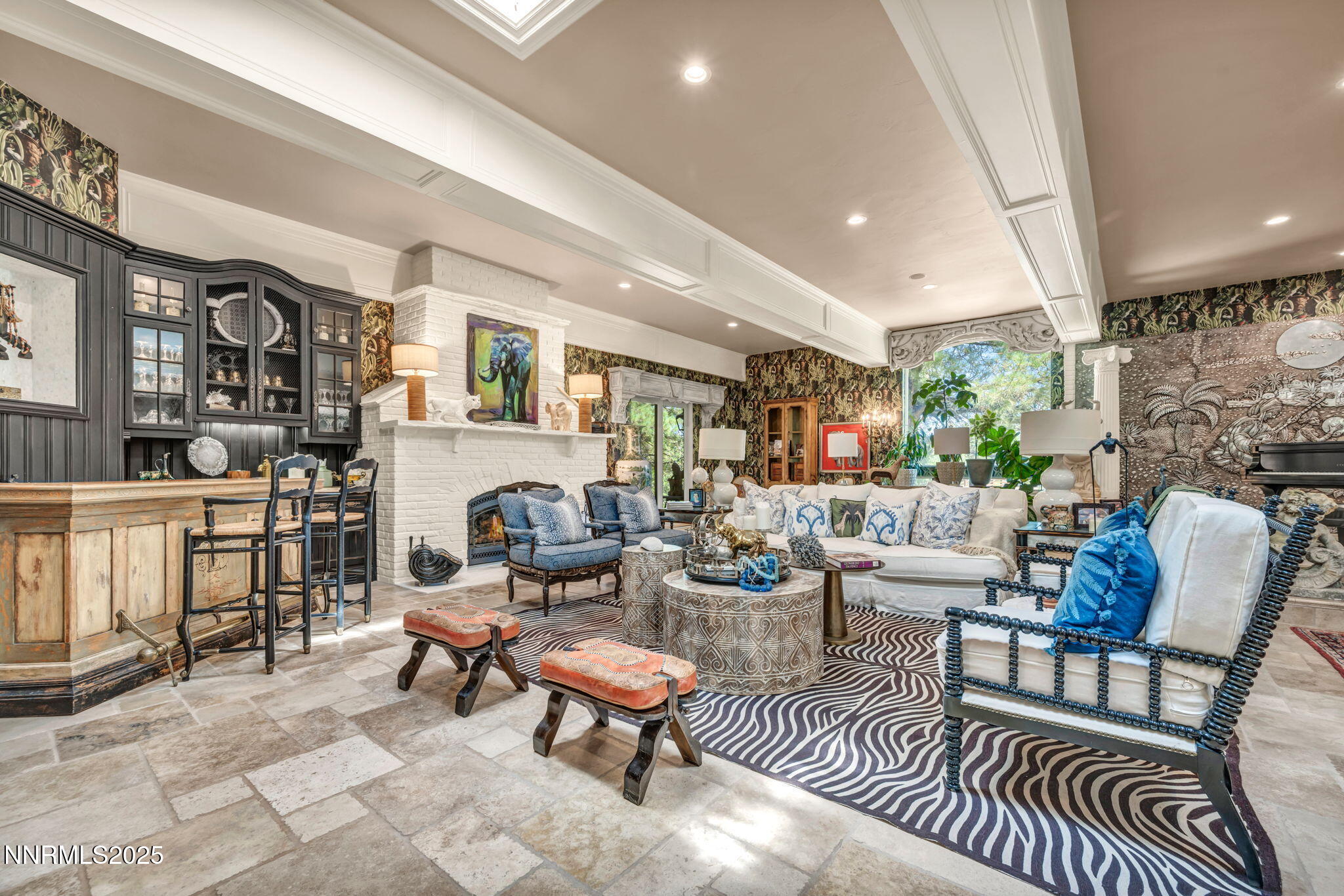 3820 Frost Lane Reno, NV 89511 - Photo 177 of 239 a living room with fireplace furniture and a painting on the wall