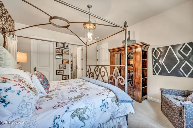 a living room with furniture a pool table and a large window
