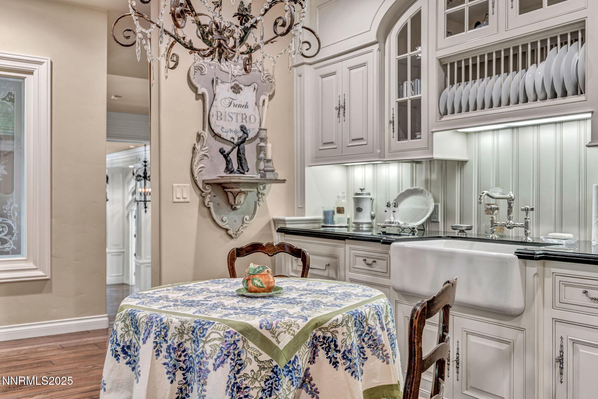 3820 Frost Lane Reno, NV 89511 - Photo 46 of 239 a kitchen with stainless steel appliances granite countertop a sink dishwasher and cabinets with wooden floor