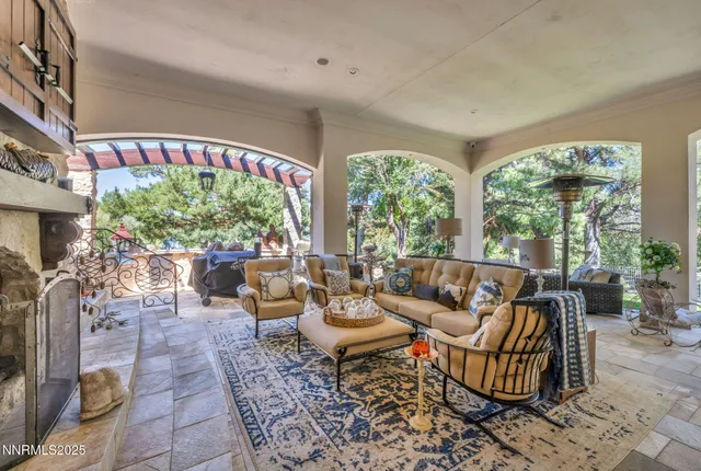 a kitchen with stainless steel appliances granite countertop a sink dishwasher and cabinets with wooden floor