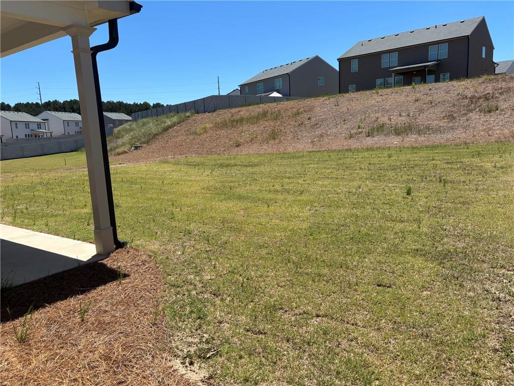 345 Rodeo Drive Auburn, GA 30011 - Photo 22 of 22 a view of a large body of water with a building in the background