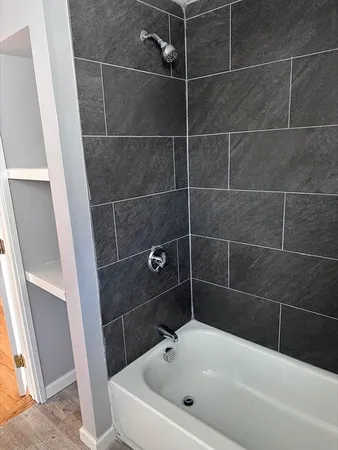 a bathroom with a bathtub