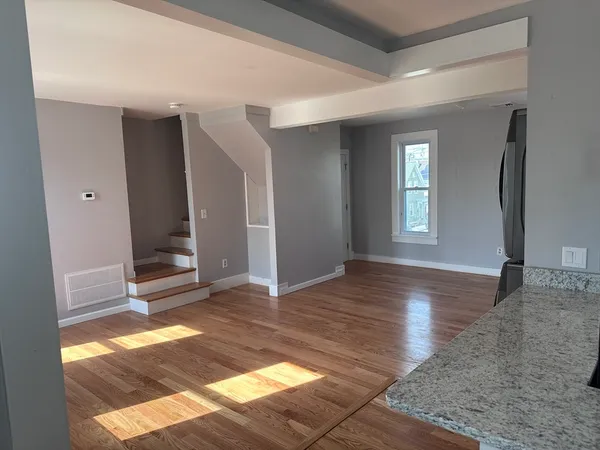 a view of an empty room and window