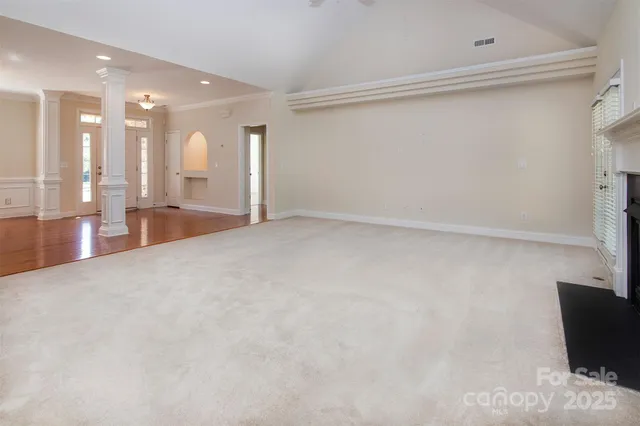 a kitchen with stainless steel appliances granite countertop a sink stove and microwave