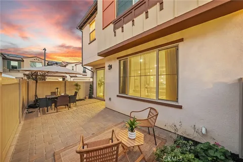 a view of a building with sitting area